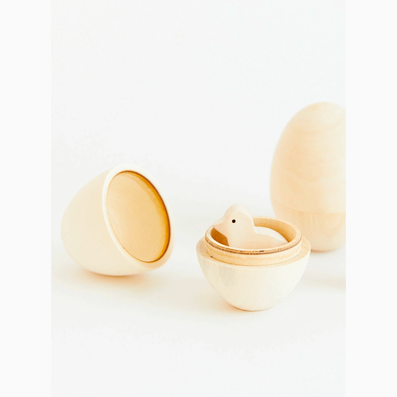 Uovo con pulcino in legno